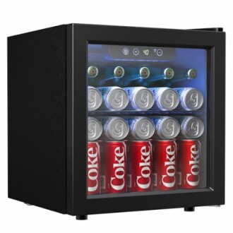 Compact fridge with soda cans and bottles.