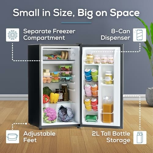 Compact fridge with freezer, can dispenser, adjustable feet, and bottle storage.